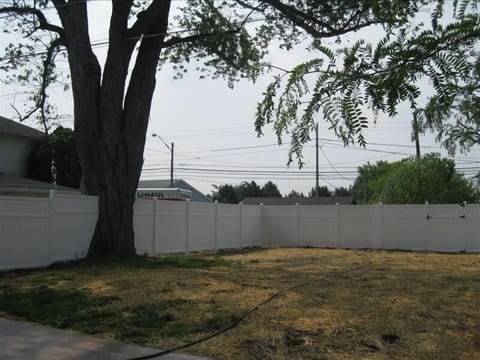 Fenced-in Back Yard with Private Enclosed Outdoor Shower and Large Patio