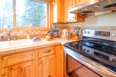 Kitchen with coffee maker, coffee pots, tea pots etc.
