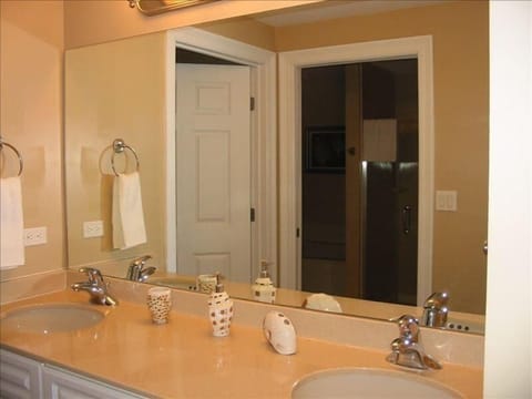 Master Bath has a double vanity, cultured marble bath and separate shower