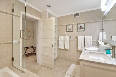 Combined shower/tub, hair dryer, towels, soap