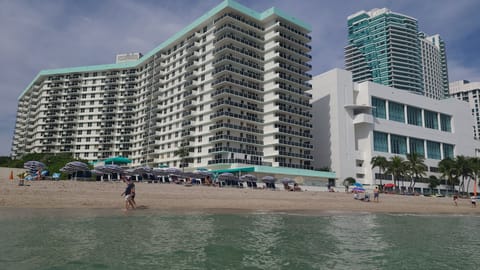 On the beach, sun loungers, beach towels