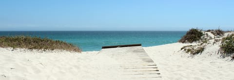 Beach nearby, sun loungers