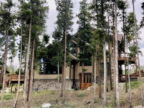 Gorgeous home with 360 degree mountain views and multiple outside areas.