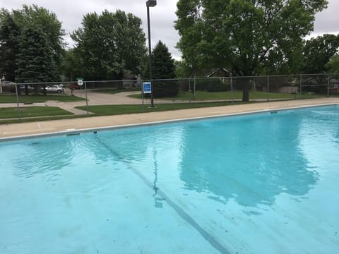 The pool for 9000 Aurora Ave is directly across the street, shown in the picture