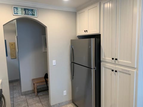 Entry hall to Kitchen. 