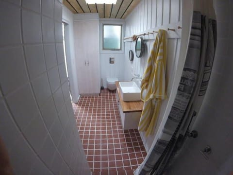 Combined shower/tub, hair dryer, towels, soap