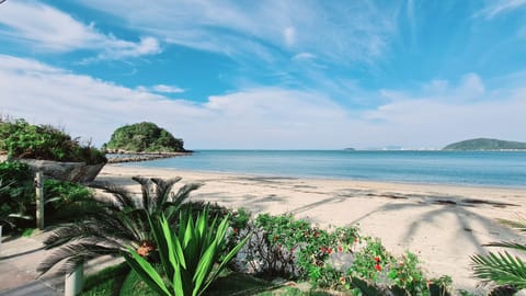 On the beach, sun loungers