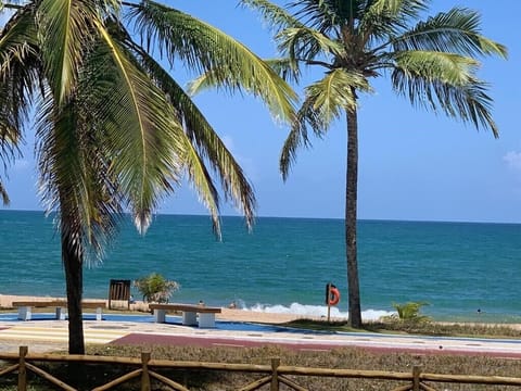 On the beach, sun loungers, beach towels