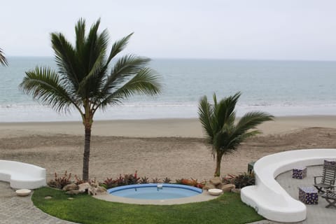 On the beach, sun loungers, beach towels