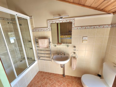 Combined shower/tub, hair dryer, towels, soap