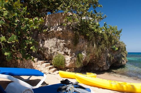 On the beach, sun loungers, beach towels