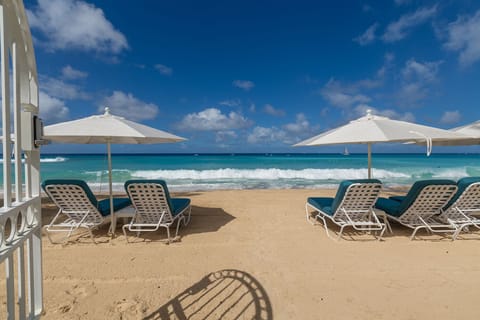 On the beach, sun loungers, beach towels