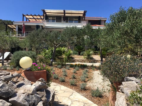 when you step down to the beach, turn back - and this is your villa Tempera