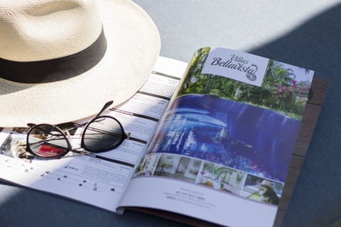 Enjoy a nice read next to the pool/ DIsfrute una buena leída junto a la alberca.