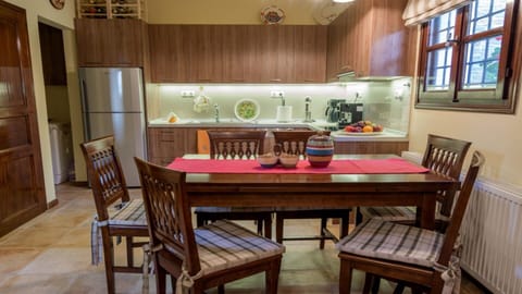 The kitchen is fully equipped and the dining area is just next to it