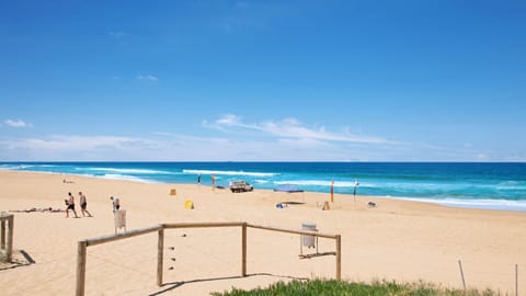 On the beach, sun loungers