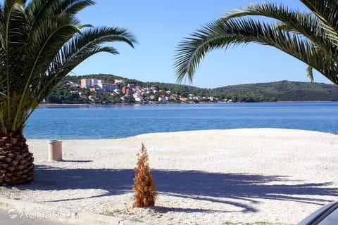 On the beach, sun loungers