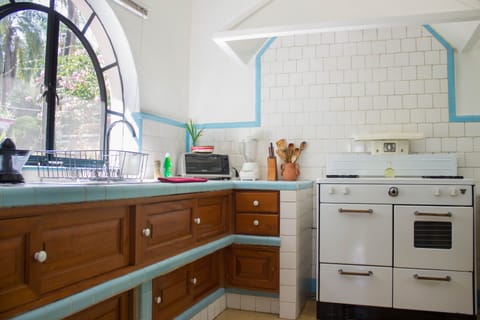 Vintage Kitchen. Fully eqquiped, view to gardens and private terrace.