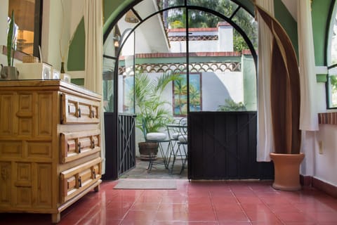 View from bed to private terrace for alfresco meals.