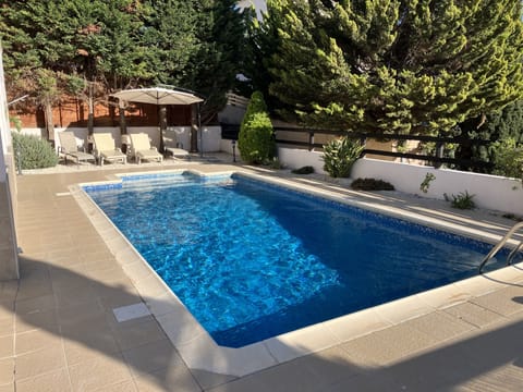 Outdoor pool, sun loungers