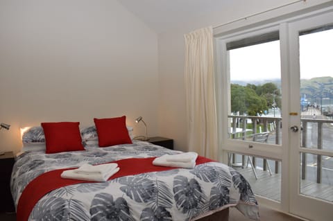 Master bedroom with queen bed, walk onto the deck and enjoy the stunning views