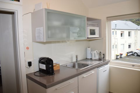 Modern well-equipped kitchenette, suitable for meals preparation