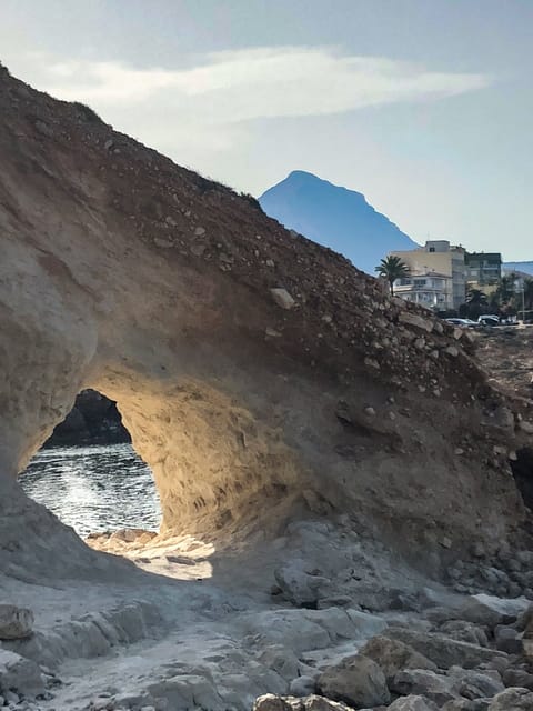 Natural arch near Cala Blanca - our favourite snorkelling site. Montgo behind.