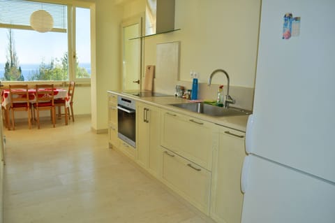 The cozy kitchen and dining area of apartment