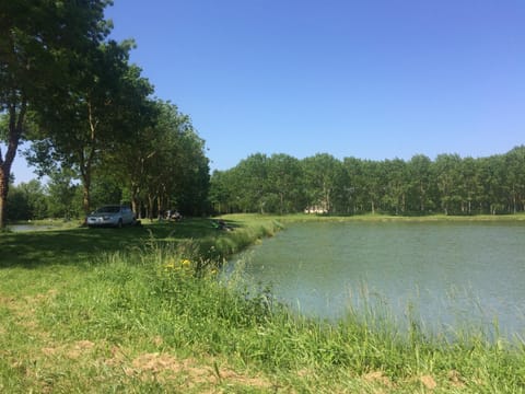Fishermen on the little pond at the village entrance