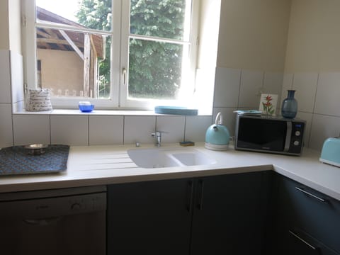 Near the window in the kitchen