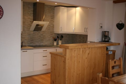 Kitchen area with handy island / bar