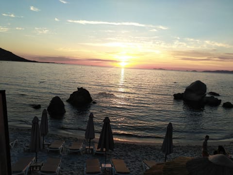 Beach nearby, sun loungers