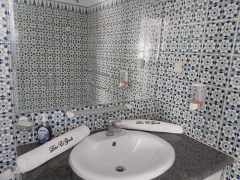 Combined shower/tub, hair dryer, towels, soap