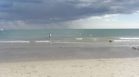 On the beach, sun loungers