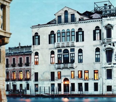 The apartment is in the palazzo on the left side of photo, first two floors