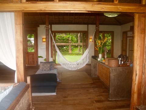Sit in the hammock and enjoy pool, sea and entrance garden views!
