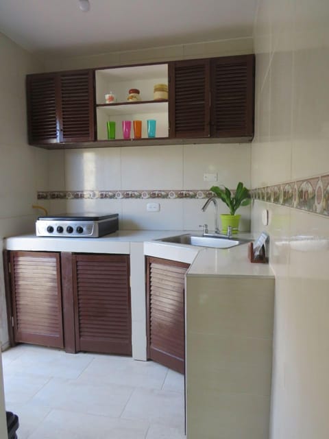 Fridge, oven, stovetop, dining tables