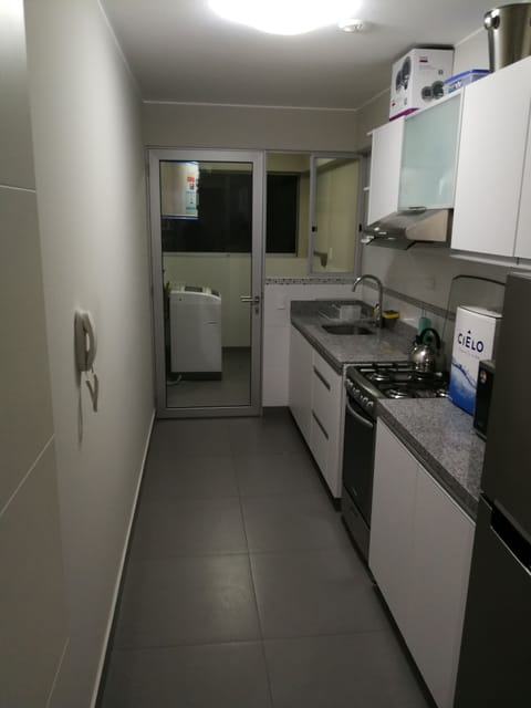 Fridge, microwave, oven, cookware/dishes/utensils