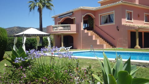 Outdoor pool, a heated pool, sun loungers