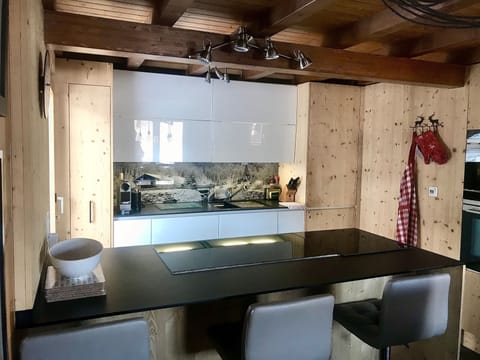 Kitchen with scenic spashback
