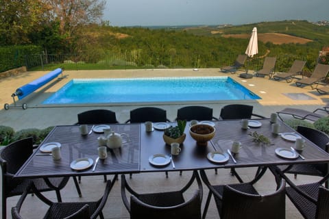 Dining and pool with magnificent views