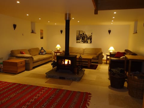Lounge with double fronted log burner