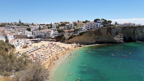 On the beach, sun loungers, beach towels