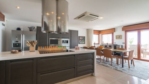Fully equipped large kitchen and dinning table for up to 12 people  