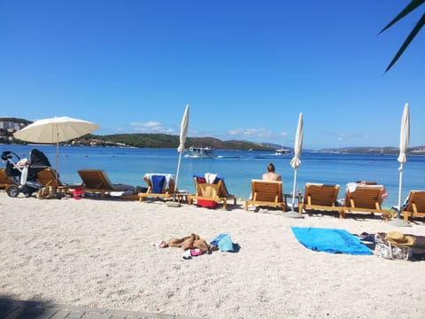 Beach nearby, sun loungers