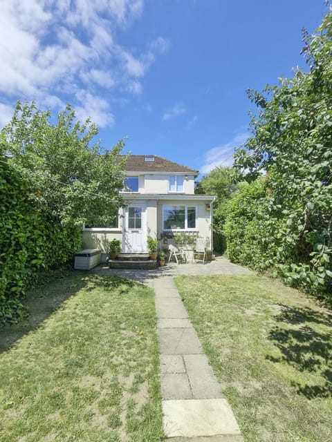 Private garden with wonderful seating area and plenty of space to run around.