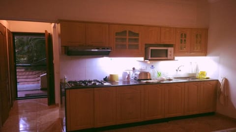 Fridge, microwave, electric kettle, cookware/dishes/utensils