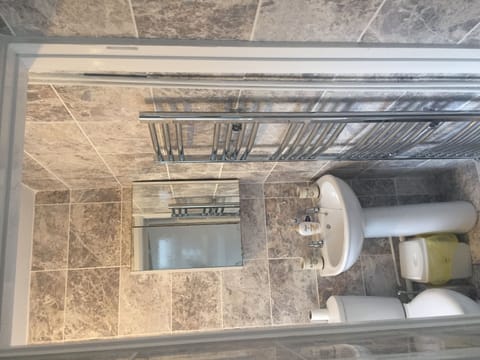 Combined shower/tub, hair dryer, towels, soap