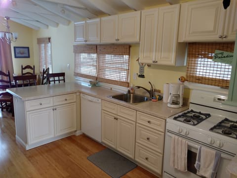 Kitchen equipped with Gas Range, Dishwasher, Microwave, 2 Coffee Makers, Toaster