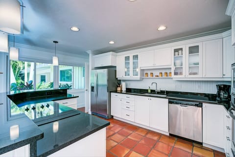 Kitchen is fully stocked and ready for the chef in your family to whip up a favorite seafood dish.  You'll feel right at home in this large kitchen.